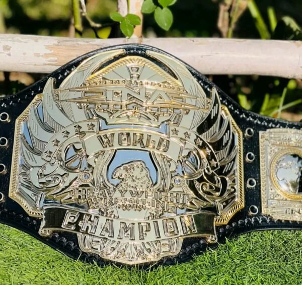 TNA World Heavyweight Wrestling Championship Belt Dual Gold Plated✅ 4mm thick zinc alloy plates ✅ Dual-tone gold & silver finish ✅ 3D engraved details with classic texture ✅ Premium-quality leather strap ✅ Ideal for display, events, or collectors